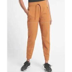 Athleta Womens Trekkie North Jogger Pants Orange Cattail Brown 12 Travel Ripstop